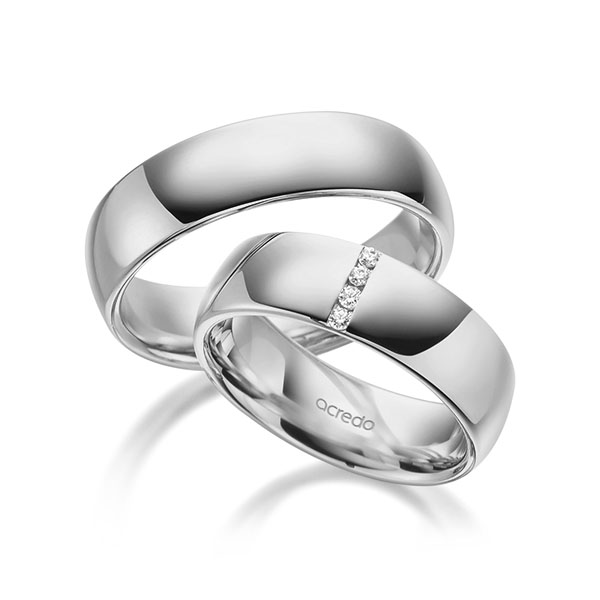 Set klassieke trouwringen in grijsgoud 14 kt. met in totaal 0,06 ct. Briljant tw/si van acredo