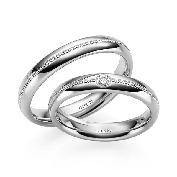 Set Klassieke trouwringen in grijsgoud 14 kt. met in totaal 0,06 ct. Briljant tw/si van acredo