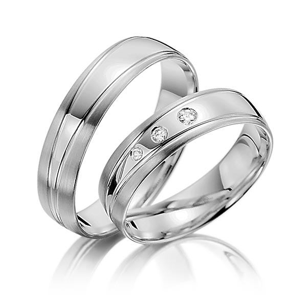 Set Klassieke trouwringen in grijsgoud 14 kt. met in totaal 0,06 ct. Briljant tw/si van Steinberg - T-1116-5 Set Klassieke trouwringen in grijsgoud 14 kt. met in totaal 0,06 ct. Briljant tw/si van Steinberg - T-1116-5