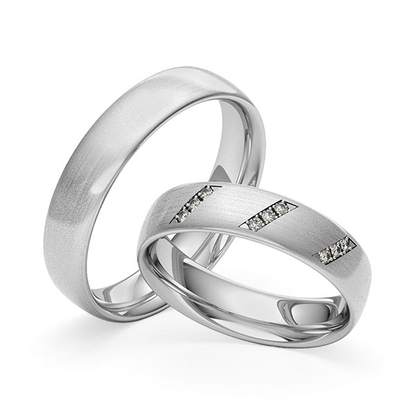 Set klassieke trouwringen in grijsgoud 14 kt. met in totaal 0,072 ct. Briljant tw/si van Merii