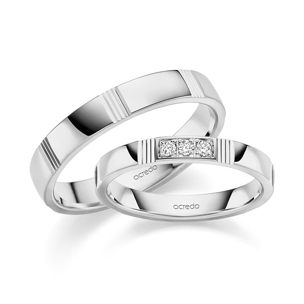 Set Klassieke trouwringen in grijsgoud 14 kt. met in totaal 0,075 ct. Briljant tw,vs van acredo