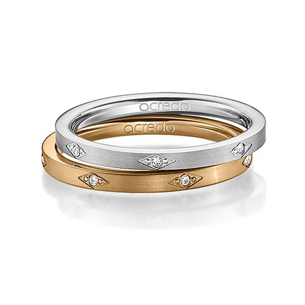 Set klassieke trouwringen in grijsgoud 14 kt. met in totaal 0,07 ct. Briljant tw/si van acredo