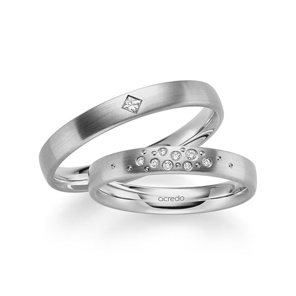 Set klassieke trouwringen in grijsgoud 14 kt. met in totaal 0,081 ct. Briljant & Princess-Diamant tw/si van acredo
