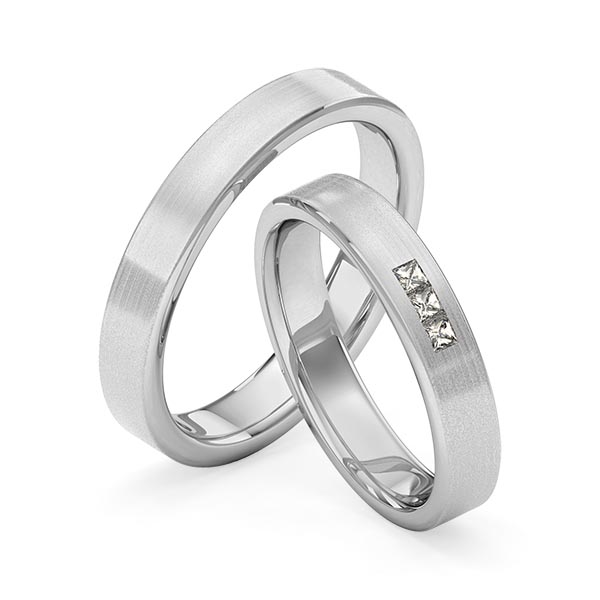 Set klassieke trouwringen in grijsgoud 14 kt. met in totaal 0,09 ct. Princess-Diamant tw,vs van Merii