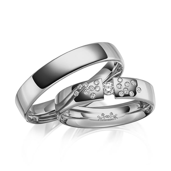 Set klassieke trouwringen in grijsgoud 14 kt. met in totaal 0,14 ct. Briljant tw/si van Steinberg