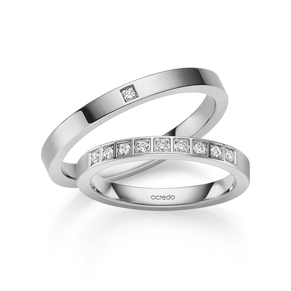 Set klassieke trouwringen in grijsgoud 14 kt. met in totaal 0,155 ct. Briljant & Princess-Diamant tw,vs van acredo