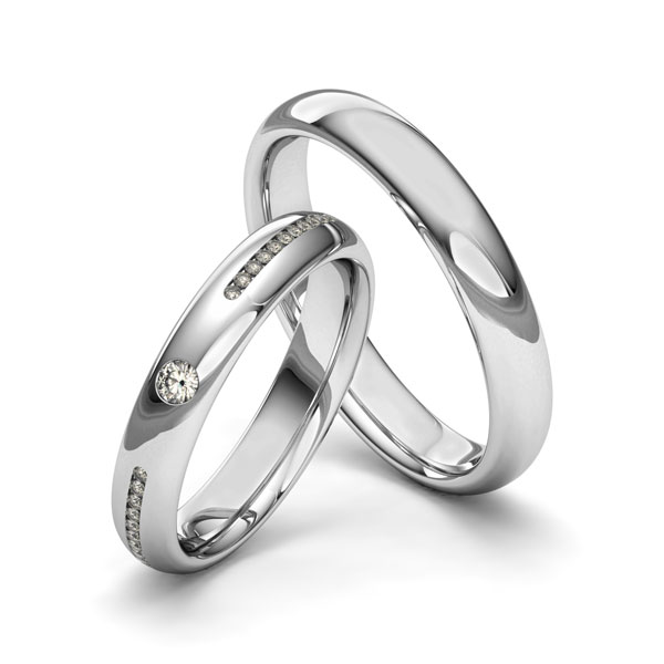 Set klassieke trouwringen in grijsgoud 14 kt. met in totaal 0,16 ct. Briljant tw/si van Merii