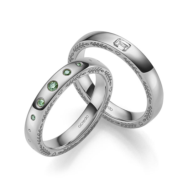 Set Klassieke trouwringen in grijsgoud 14 kt. met in totaal 0,18 ct. Briljant tw,vs van acredo