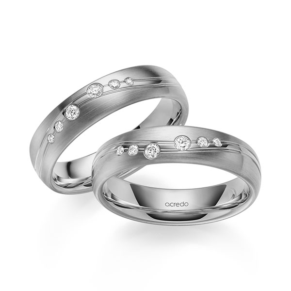 Set Klassieke trouwringen in grijsgoud 14 kt. met in totaal 0,18 ct. Briljant tw/si van acredo