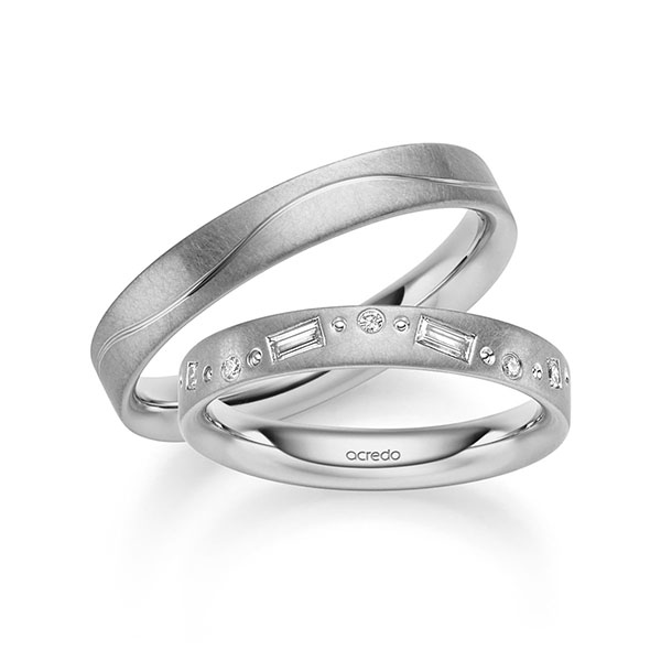 Set Klassieke trouwringen in grijsgoud 14 kt. met in totaal 0,19 ct. Baguette-Diamant & Princess-Diamant & Briljant tw,vs van acredo - S-1376-2 Set Klassieke trouwringen in grijsgoud 14 kt. met in totaal 0,19 ct. Baguette-Diamant & Princess-Diamant & Briljant tw,vs van acredo - S-1376-2