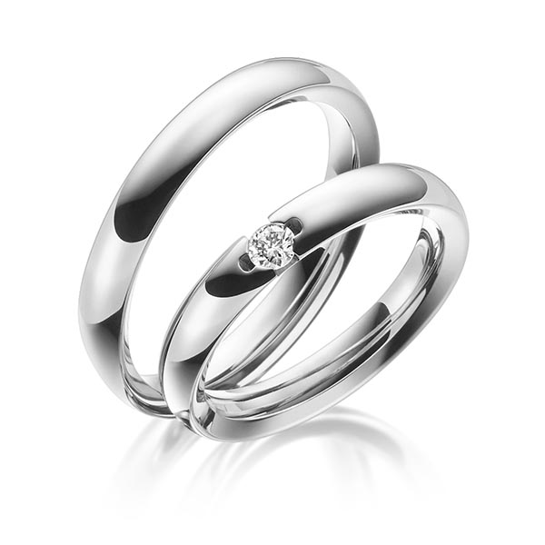 Set klassieke trouwringen in grijsgoud 14 kt. met in totaal 0,1 ct. Briljant tw/si van Steinberg