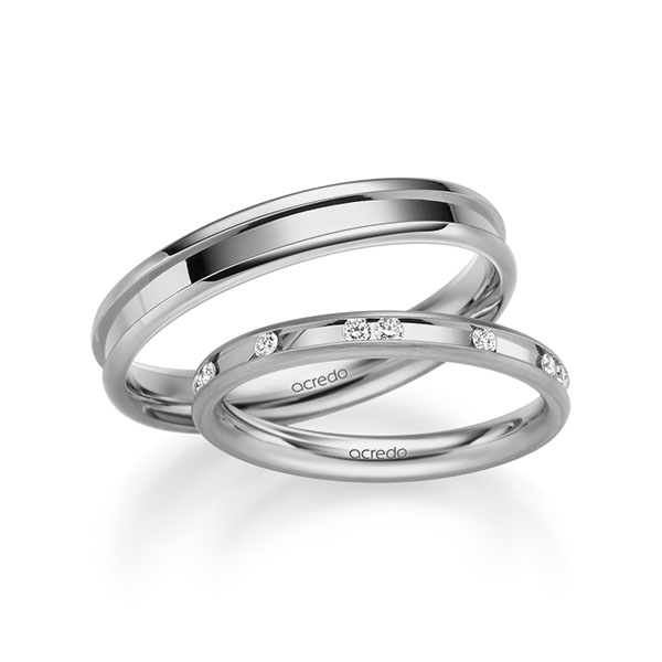 Set Klassieke trouwringen in grijsgoud 14 kt. met in totaal 0,225 ct. Briljant tw/si van acredo - A-2224-10 Set Klassieke trouwringen in grijsgoud 14 kt. met in totaal 0,225 ct. Briljant tw/si van acredo - A-2224-10
