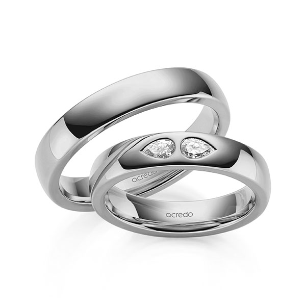 Set klassieke trouwringen in grijsgoud 14 kt. met in totaal 0,2 ct. tw,vs van acredo