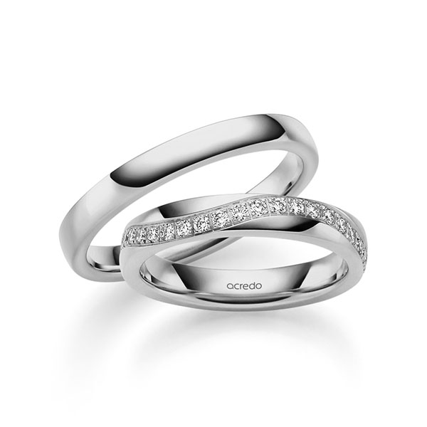 Set klassieke trouwringen in grijsgoud 14 kt. met in totaal 0,3 ct. Briljant tw/si van acredo