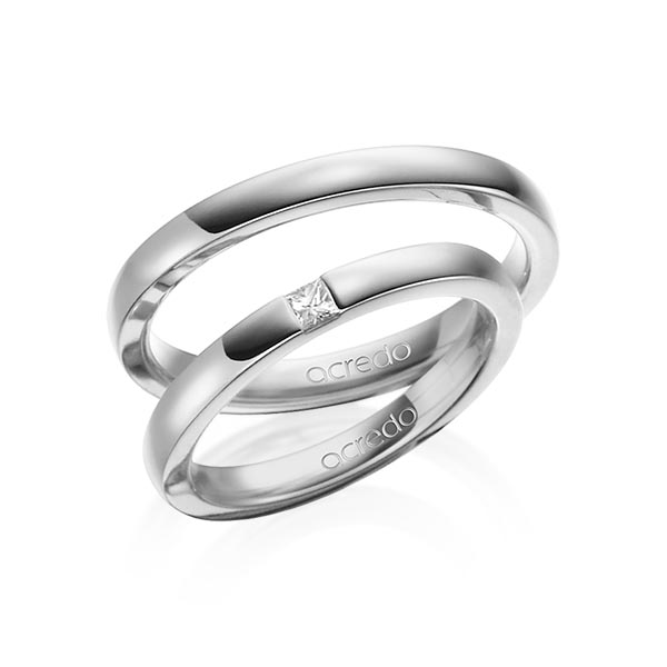 Set klassieke trouwringen in grijsgoud 18 kt. met in totaal 0,07 ct. Princess-Diamant tw/si van acredo