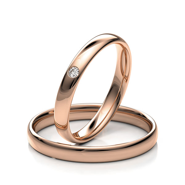 Set Klassieke trouwringen in rood 9 kt. goudhoudend metaal (37,5%) met in totaal 0,025 ct. Briljant tw/si 