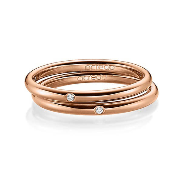Set klassieke trouwringen in roodgoud 14 kt. met in totaal 0,02 ct. Briljant tw/si van acredo