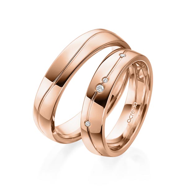 Set Klassieke trouwringen in roodgoud 14 kt. met in totaal 0,036 ct. Briljant tw/si van acredo