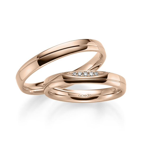 Set Klassieke trouwringen in roodgoud 14 kt. met in totaal 0,036 ct. Briljant tw/si van acredo
