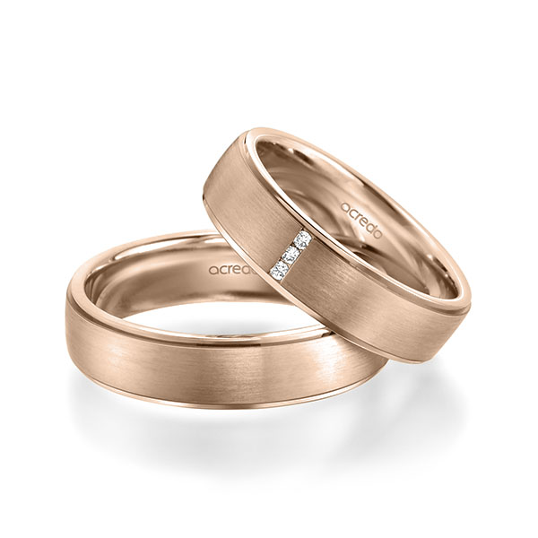 Set Klassieke trouwringen in roodgoud 14 kt. met in totaal 0,03 ct. Briljant tw/si van acredo