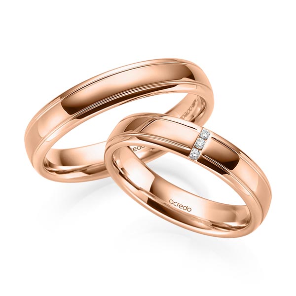 Set Klassieke trouwringen in roodgoud 14 kt. met in totaal 0,03 ct. Briljant tw/si van acredo