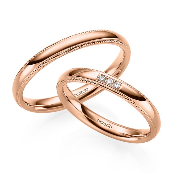 Set Klassieke trouwringen in roodgoud 14 kt. met in totaal 0,03 ct. Briljant tw/si van acredo