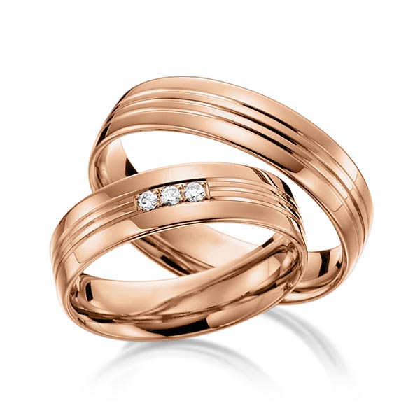 Set Klassieke trouwringen in roodgoud 14 kt. met in totaal 0,045 ct. Briljant tw/si van acredo