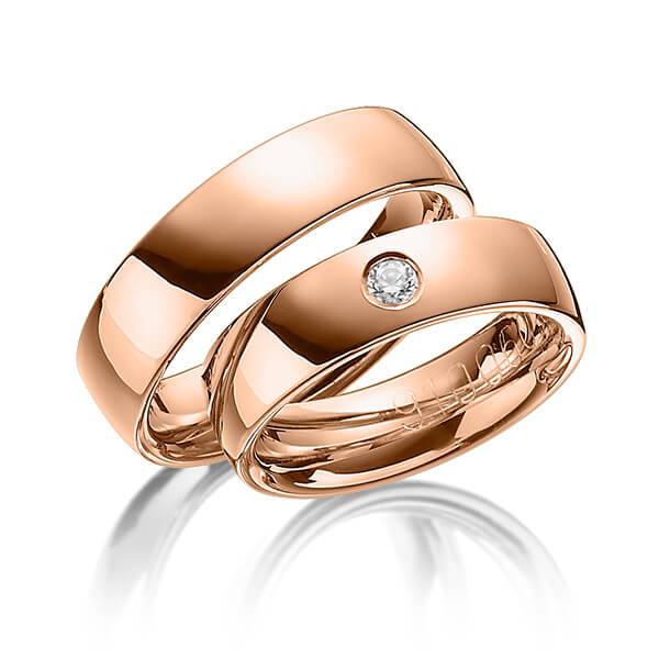 Set klassieke trouwringen in roodgoud 14 kt. met in totaal 0,04 ct. Briljant tw/si van Merii