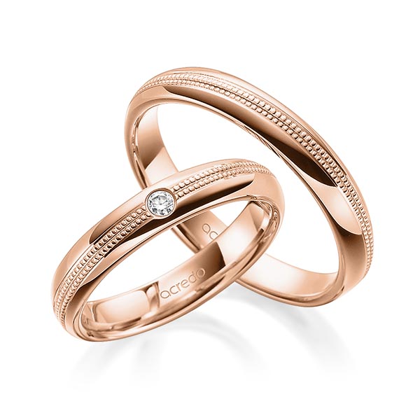 Set Klassieke trouwringen in roodgoud 14 kt. met in totaal 0,05 ct. Briljant tw/si van acredo Set Klassieke trouwringen in roodgoud 14 kt. met in totaal 0,05 ct. Briljant tw/si van acredo