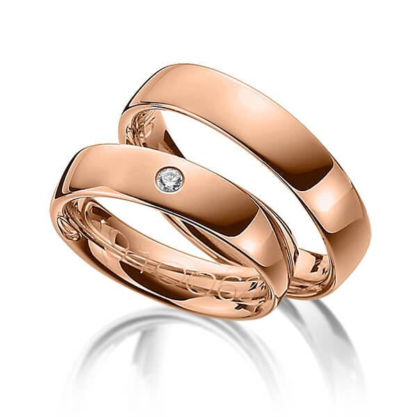 Set klassieke trouwringen in roodgoud 14 kt. met in totaal 0,05 ct. Briljant tw/si van Merii