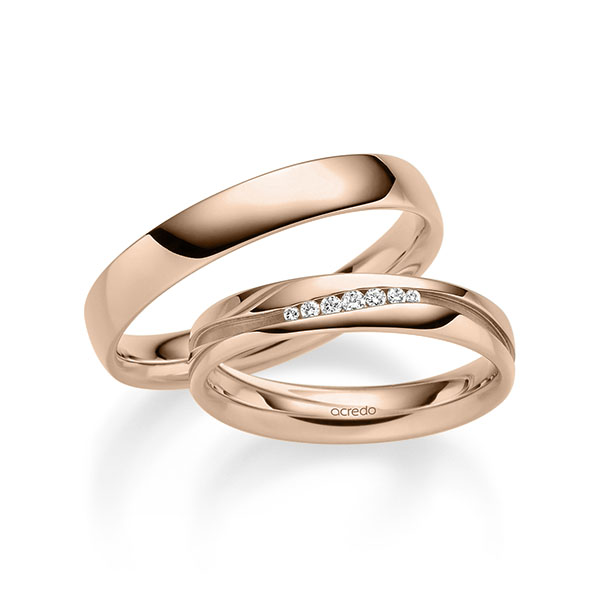 Set klassieke trouwringen in roodgoud 14 kt. met in totaal 0,063 ct. Briljant tw/si van acredo
