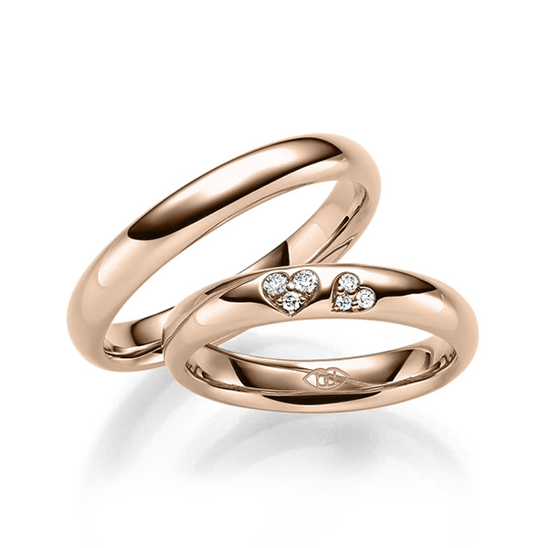Set Klassieke trouwringen in roodgoud 14 kt. met in totaal 0,065 ct. Briljant tw/si 
