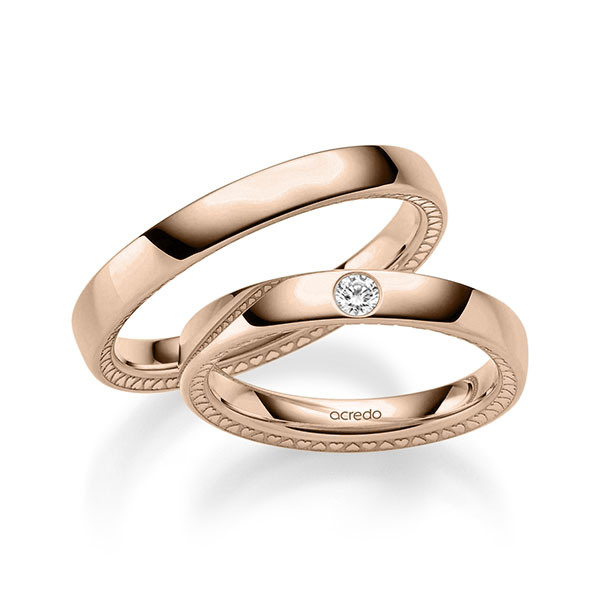 Set Klassieke trouwringen in roodgoud 14 kt. met in totaal 0,06 ct. Briljant tw/si van acredo
