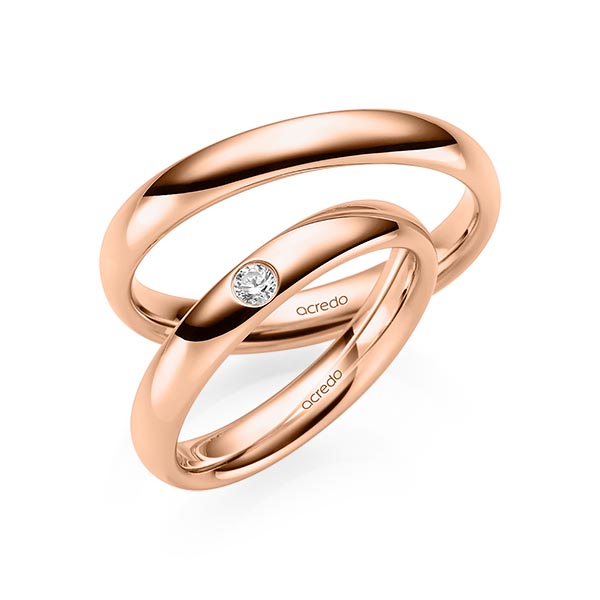 Set klassieke trouwringen in roodgoud 14 kt. met in totaal 0,06 ct. Briljant tw/si van acredo