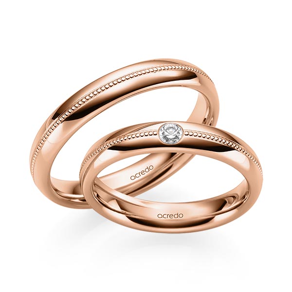Set Klassieke trouwringen in roodgoud 14 kt. met in totaal 0,06 ct. Briljant tw/si van acredo