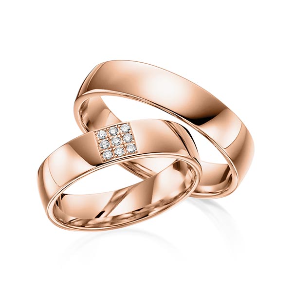 Set klassieke trouwringen in roodgoud 14 kt. met in totaal 0,072 ct. Briljant tw/si van acredo