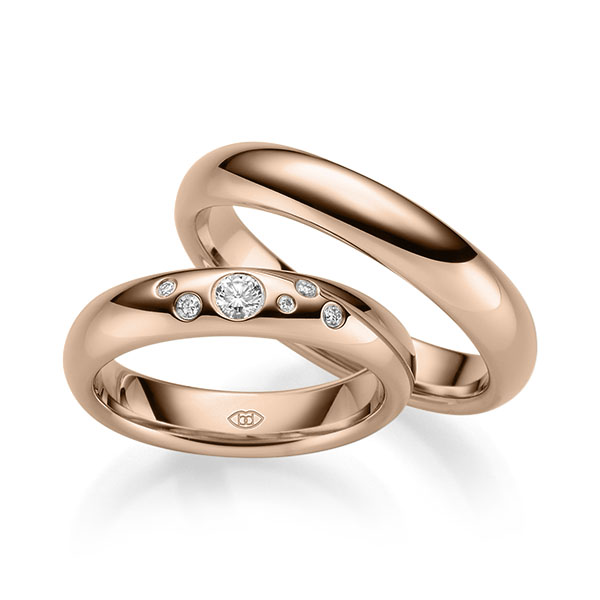 Set Klassieke trouwringen in roodgoud 14 kt. met in totaal 0,146 ct. Briljant tw/si 