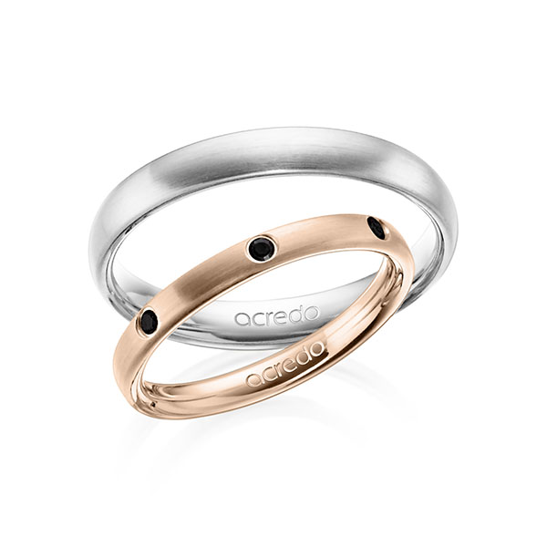 Set klassieke trouwringen in roodgoud 14 kt. met in totaal 0,14 ct. Briljant Zwart van acredo