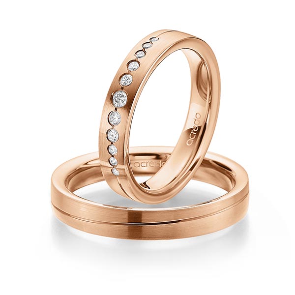 Set Klassieke trouwringen in roodgoud 14 kt. met in totaal 0,156 ct. Briljant tw/si van acredo
