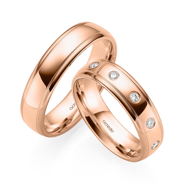 Set Klassieke trouwringen in roodgoud 14 kt. met in totaal 0,15 ct. Briljant tw/si van acredo