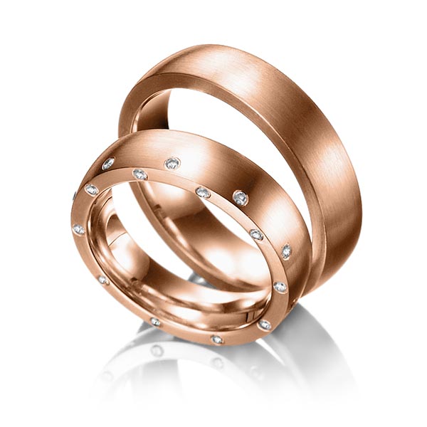 Set klassieke trouwringen in roodgoud 14 kt. met in totaal 0,25 ct. Briljant tw/si van Eternal Touch