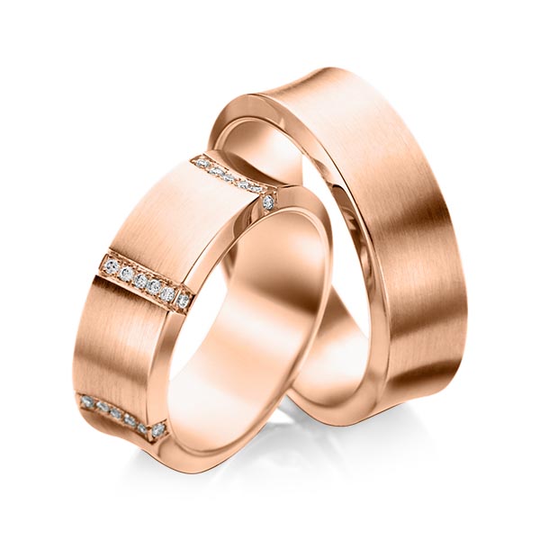 Set klassieke trouwringen in roodgoud 14 kt. met in totaal 0,336 ct. Briljant tw/si van acredo