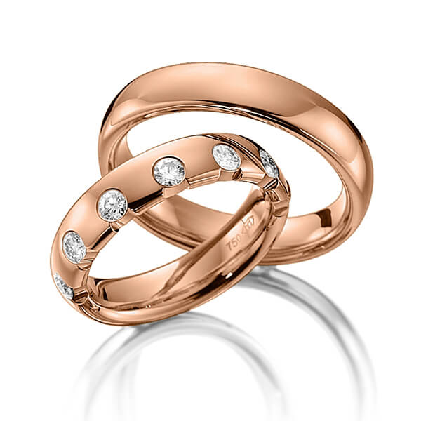 Set klassieke trouwringen in roodgoud 14 kt. met in totaal 0,49 ct. Briljant tw/si van Steinberg