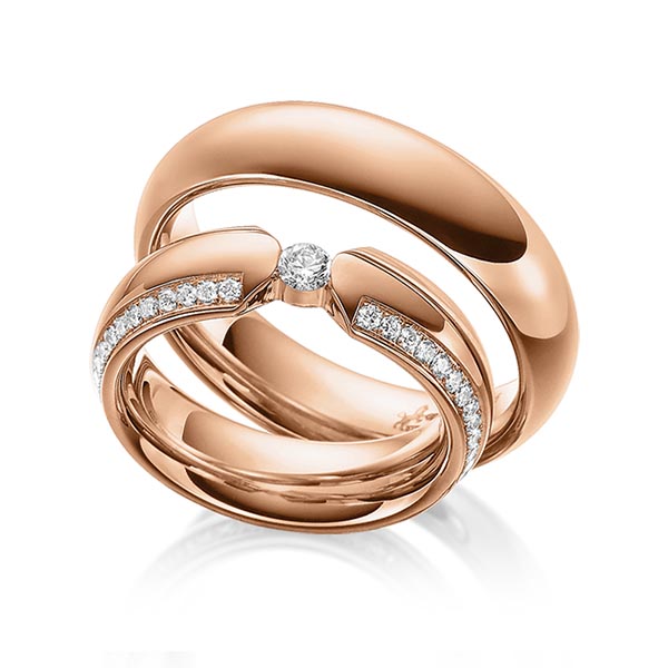 Set klassieke trouwringen in roodgoud 14 kt. met in totaal 0,56 ct. Briljant tw/si van Steinberg