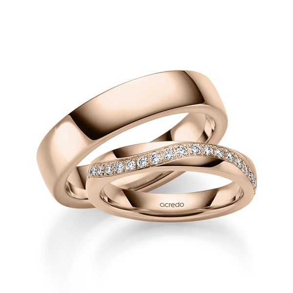 Set klassieke trouwringen in roodgoud 14 kt. met in totaal 0,6 ct. Briljant tw/si van acredo