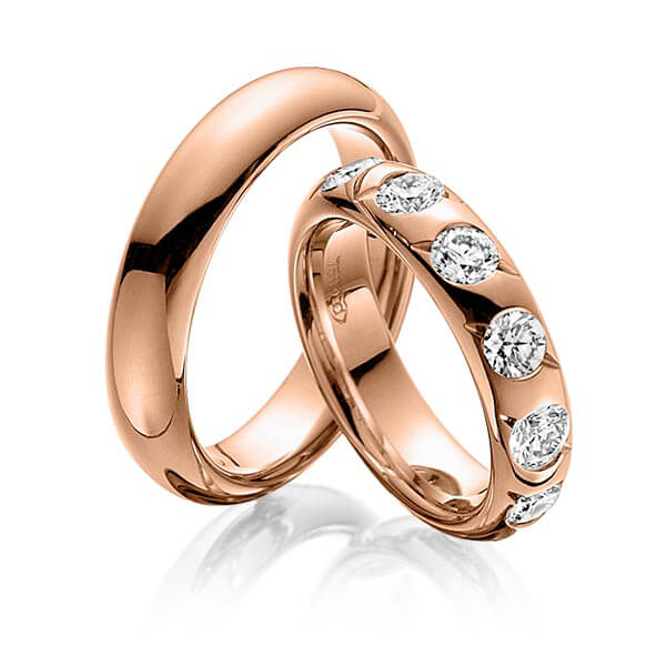 Set klassieke trouwringen in roodgoud 14 kt. met in totaal 1,32 ct. Briljant tw/si van Eternal Touch