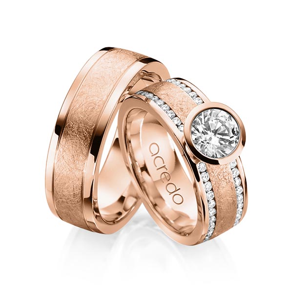 Set Klassieke trouwringen in roodgoud 18 kt. met 1 ct. + in totaal 0,4 ct. Briljant & Briljanten tw/si van acredo - A-1208-4 Set Klassieke trouwringen in roodgoud 18 kt. met 1 ct. + in totaal 0,4 ct. Briljant & Briljanten tw/si van acredo - A-1208-4