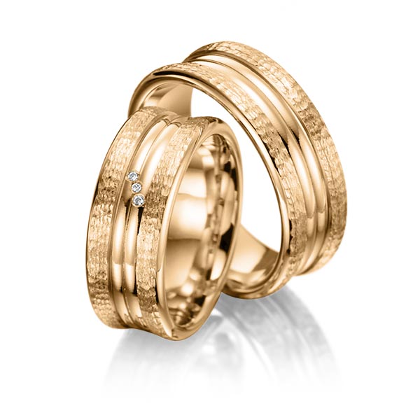 Set Klassieke trouwringen in roségoud 14 kt. hamerslag, met in totaal 0,015 ct. Briljant tw/si van Merii
