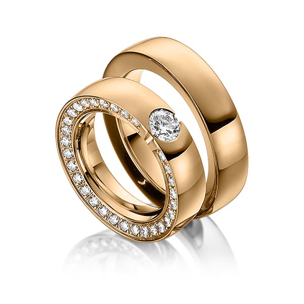 Set klassieke trouwringen in roségoud 14 kt. met 0,5 ct. + in totaal 0,9 ct. Briljant tw/si van Steinberg - Q-1170-1 Set klassieke trouwringen in roségoud 14 kt. met 0,5 ct. + in totaal 0,9 ct. Briljant tw/si van Steinberg - Q-1170-1