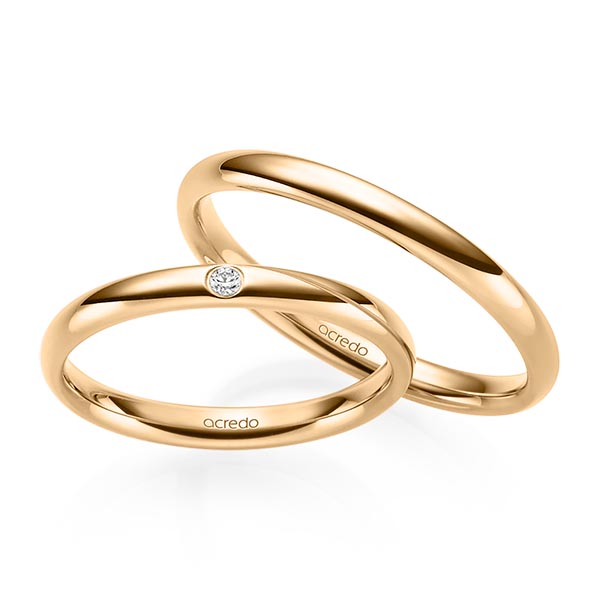 Set klassieke trouwringen in roségoud 14 kt. met in totaal 0,02 ct. Briljant tw/si van acredo
